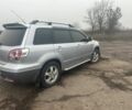 Сірий Міцубісі Аутлендер, об'ємом двигуна 2.4 л та пробігом 275 тис. км за 6400 $, фото 3 на Automoto.ua
