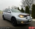 Серый Мицубиси Аутлендер, объемом двигателя 2 л и пробегом 220 тыс. км за 5000 $, фото 1 на Automoto.ua
