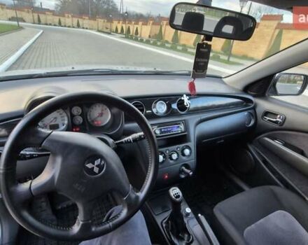 Серый Мицубиси Аутлендер, объемом двигателя 2 л и пробегом 209 тыс. км за 5800 $, фото 9 на Automoto.ua