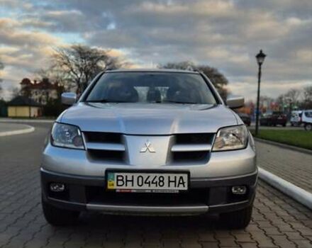 Серый Мицубиси Аутлендер, объемом двигателя 2 л и пробегом 209 тыс. км за 5800 $, фото 4 на Automoto.ua