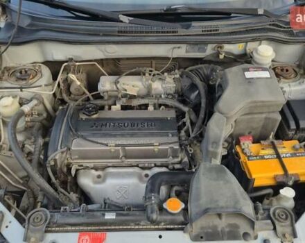 Серый Мицубиси Аутлендер, объемом двигателя 2 л и пробегом 209 тыс. км за 5800 $, фото 11 на Automoto.ua