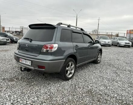 Серый Мицубиси Аутлендер, объемом двигателя 0 л и пробегом 265 тыс. км за 6300 $, фото 3 на Automoto.ua