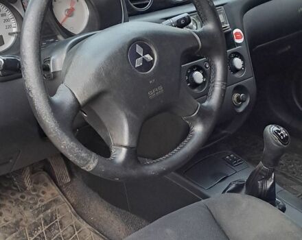 Серый Мицубиси Аутлендер, объемом двигателя 2 л и пробегом 240 тыс. км за 3900 $, фото 7 на Automoto.ua