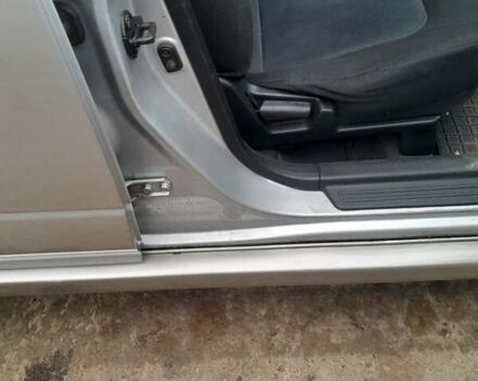 Серый Мицубиси Аутлендер, объемом двигателя 2.4 л и пробегом 250 тыс. км за 5600 $, фото 3 на Automoto.ua