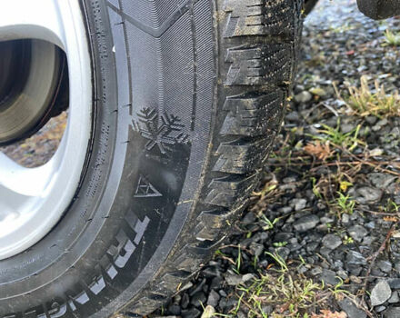 Серый Мицубиси Аутлендер, объемом двигателя 2 л и пробегом 250 тыс. км за 5700 $, фото 13 на Automoto.ua