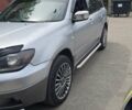 Сірий Міцубісі Аутлендер, об'ємом двигуна 2 л та пробігом 300 тис. км за 7000 $, фото 1 на Automoto.ua