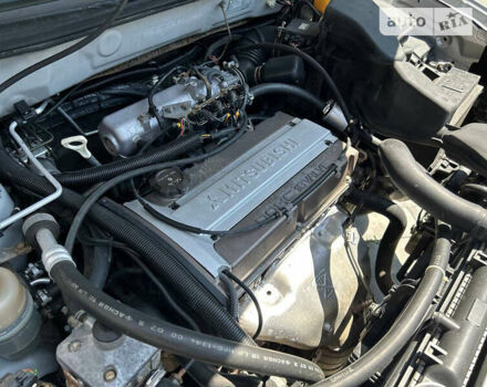 Серый Мицубиси Аутлендер, объемом двигателя 2 л и пробегом 230 тыс. км за 6000 $, фото 17 на Automoto.ua