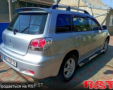 Серый Мицубиси Аутлендер, объемом двигателя 2 л и пробегом 280 тыс. км за 5500 $, фото 6 на Automoto.ua