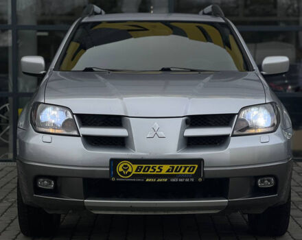 Сірий Міцубісі Аутлендер, об'ємом двигуна 2.4 л та пробігом 240 тис. км за 6700 $, фото 1 на Automoto.ua