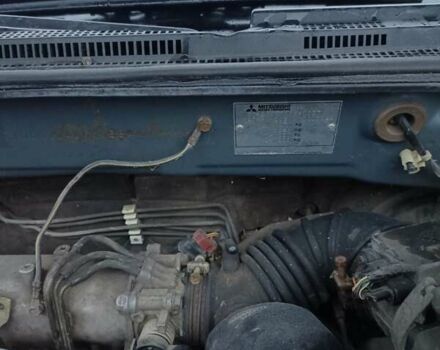 Сірий Міцубісі Аутлендер, об'ємом двигуна 2 л та пробігом 160 тис. км за 4800 $, фото 16 на Automoto.ua