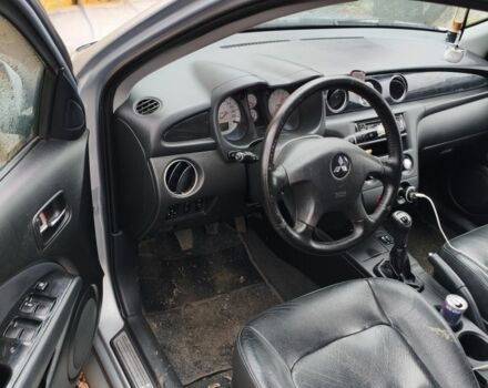 Серый Мицубиси Аутлендер, объемом двигателя 2 л и пробегом 371 тыс. км за 5700 $, фото 6 на Automoto.ua