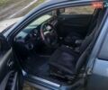 Серый Мицубиси Аутлендер, объемом двигателя 2 л и пробегом 303 тыс. км за 6500 $, фото 3 на Automoto.ua