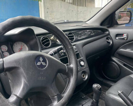 Сірий Міцубісі Аутлендер, об'ємом двигуна 2 л та пробігом 252 тис. км за 4600 $, фото 22 на Automoto.ua