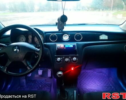 Серый Мицубиси Аутлендер, объемом двигателя 2 л и пробегом 0 тыс. км за 5000 $, фото 4 на Automoto.ua