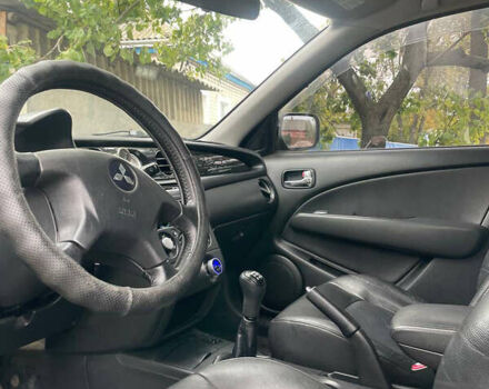 Сірий Міцубісі Аутлендер, об'ємом двигуна 2 л та пробігом 252 тис. км за 4600 $, фото 18 на Automoto.ua