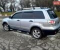 Серый Мицубиси Аутлендер, объемом двигателя 2 л и пробегом 400 тыс. км за 5000 $, фото 7 на Automoto.ua