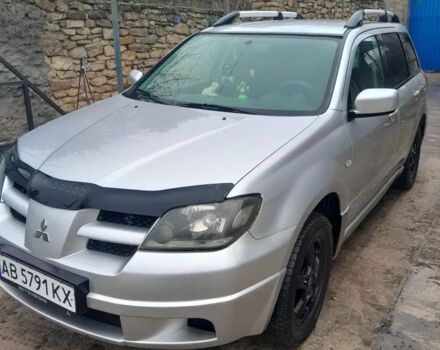 Серый Мицубиси Аутлендер, объемом двигателя 2.4 л и пробегом 250 тыс. км за 5600 $, фото 2 на Automoto.ua