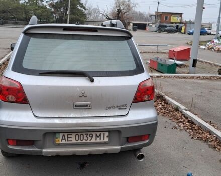 Серый Мицубиси Аутлендер, объемом двигателя 2 л и пробегом 240 тыс. км за 3900 $, фото 6 на Automoto.ua