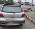 Серый Мицубиси Аутлендер, объемом двигателя 2 л и пробегом 240 тыс. км за 3900 $, фото 6 на Automoto.ua