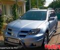 Серый Мицубиси Аутлендер, объемом двигателя 2 л и пробегом 280 тыс. км за 5500 $, фото 1 на Automoto.ua