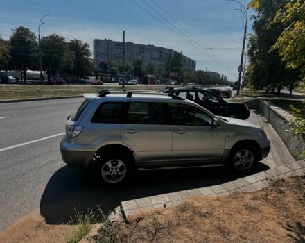 Сірий Міцубісі Аутлендер, об'ємом двигуна 2.4 л та пробігом 285 тис. км за 4400 $, фото 5 на Automoto.ua