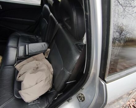 Серый Мицубиси Аутлендер, объемом двигателя 2 л и пробегом 371 тыс. км за 5700 $, фото 3 на Automoto.ua