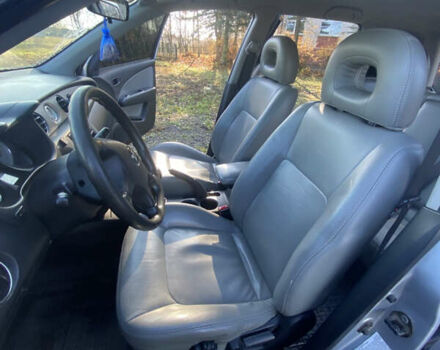 Серый Мицубиси Аутлендер, объемом двигателя 2 л и пробегом 250 тыс. км за 5700 $, фото 7 на Automoto.ua