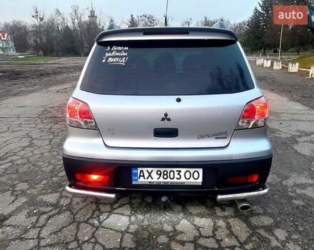 Серый Мицубиси Аутлендер, объемом двигателя 2 л и пробегом 400 тыс. км за 5000 $, фото 6 на Automoto.ua