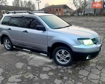 Серый Мицубиси Аутлендер, объемом двигателя 2 л и пробегом 400 тыс. км за 5000 $, фото 10 на Automoto.ua