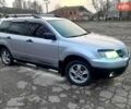 Серый Мицубиси Аутлендер, объемом двигателя 2 л и пробегом 400 тыс. км за 5000 $, фото 10 на Automoto.ua