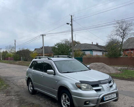 Сірий Міцубісі Аутлендер, об'ємом двигуна 2 л та пробігом 252 тис. км за 4600 $, фото 5 на Automoto.ua