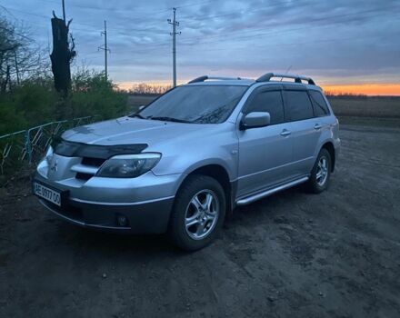 Сірий Міцубісі Аутлендер, об'ємом двигуна 2.4 л та пробігом 275 тис. км за 6400 $, фото 12 на Automoto.ua