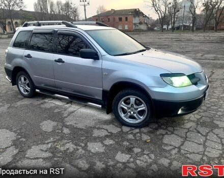 Серый Мицубиси Аутлендер, объемом двигателя 2 л и пробегом 0 тыс. км за 5000 $, фото 11 на Automoto.ua