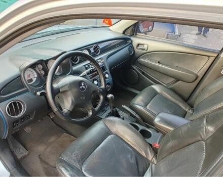 Серый Мицубиси Аутлендер, объемом двигателя 2 л и пробегом 205 тыс. км за 6000 $, фото 3 на Automoto.ua