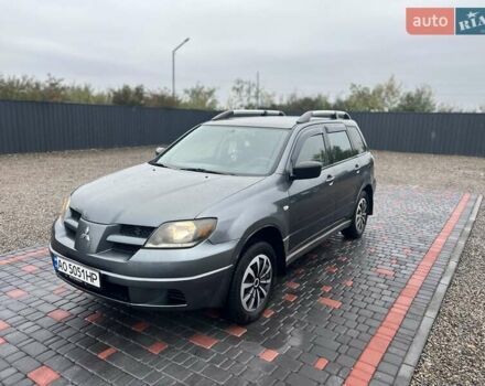 Сірий Міцубісі Аутлендер, об'ємом двигуна 1.98 л та пробігом 350 тис. км за 3950 $, фото 4 на Automoto.ua