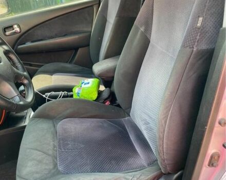 Сірий Міцубісі Аутлендер, об'ємом двигуна 2.4 л та пробігом 285 тис. км за 4400 $, фото 3 на Automoto.ua