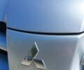 Сірий Міцубісі Аутлендер, об'ємом двигуна 2 л та пробігом 300 тис. км за 4800 $, фото 2 на Automoto.ua
