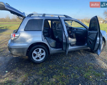 Серый Мицубиси Аутлендер, объемом двигателя 2 л и пробегом 250 тыс. км за 5700 $, фото 16 на Automoto.ua