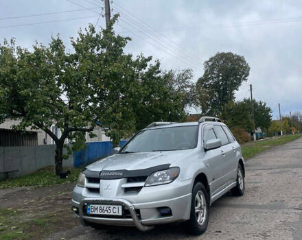 Сірий Міцубісі Аутлендер, об'ємом двигуна 2 л та пробігом 252 тис. км за 4600 $, фото 4 на Automoto.ua