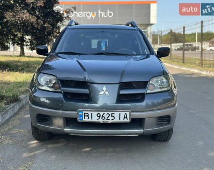 Сірий Міцубісі Аутлендер, об'ємом двигуна 2 л та пробігом 363 тис. км за 5450 $, фото 1 на Automoto.ua