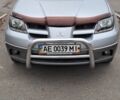 Серый Мицубиси Аутлендер, объемом двигателя 2 л и пробегом 240 тыс. км за 3900 $, фото 1 на Automoto.ua