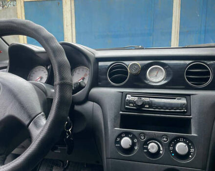 Сірий Міцубісі Аутлендер, об'ємом двигуна 2 л та пробігом 252 тис. км за 4600 $, фото 26 на Automoto.ua