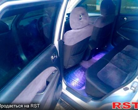 Серый Мицубиси Аутлендер, объемом двигателя 2 л и пробегом 0 тыс. км за 5000 $, фото 5 на Automoto.ua