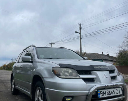 Сірий Міцубісі Аутлендер, об'ємом двигуна 2 л та пробігом 252 тис. км за 4600 $, фото 6 на Automoto.ua