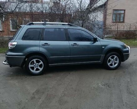 Сірий Міцубісі Аутлендер, об'ємом двигуна 2 л та пробігом 160 тис. км за 4800 $, фото 2 на Automoto.ua