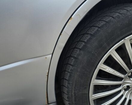 Серый Мицубиси Аутлендер, объемом двигателя 2 л и пробегом 300 тыс. км за 7000 $, фото 5 на Automoto.ua