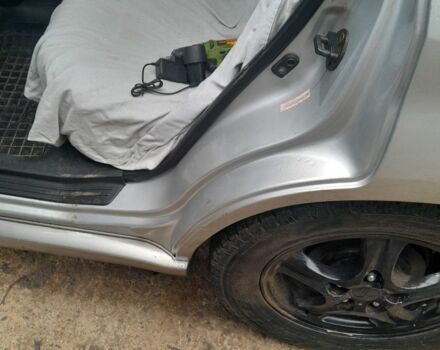 Серый Мицубиси Аутлендер, объемом двигателя 2.4 л и пробегом 250 тыс. км за 5600 $, фото 6 на Automoto.ua