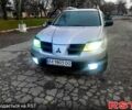 Серый Мицубиси Аутлендер, объемом двигателя 2 л и пробегом 0 тыс. км за 5000 $, фото 10 на Automoto.ua