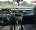 Серый Мицубиси Аутлендер, объемом двигателя 2.4 л и пробегом 249 тыс. км за 4999 $, фото 6 на Automoto.ua