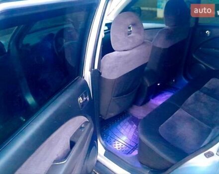 Серый Мицубиси Аутлендер, объемом двигателя 2 л и пробегом 400 тыс. км за 5000 $, фото 4 на Automoto.ua